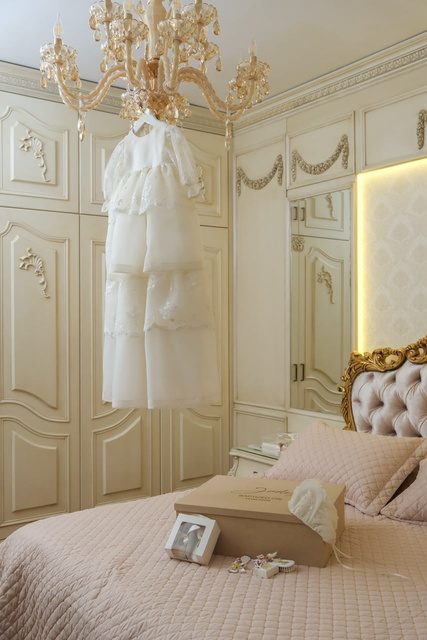 Executed bed wall with gilded headboard