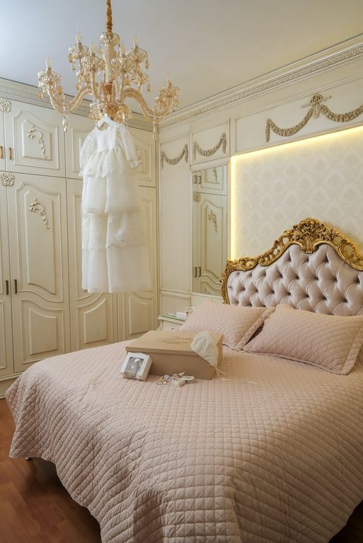 Executed bed and panelled wardrobes